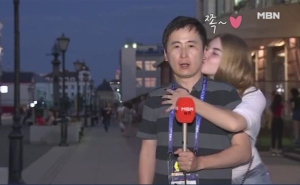 Two Girls Kissed A Male Journo When He Was Reporting Live At FIFA World Cup 2018. See The Video - RVCJ Media