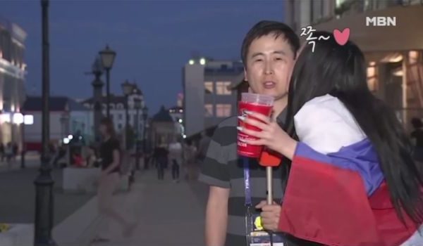 Two Girls Kissed A Male Journo When He Was Reporting Live At FIFA World Cup 2018. See The Video - RVCJ Media