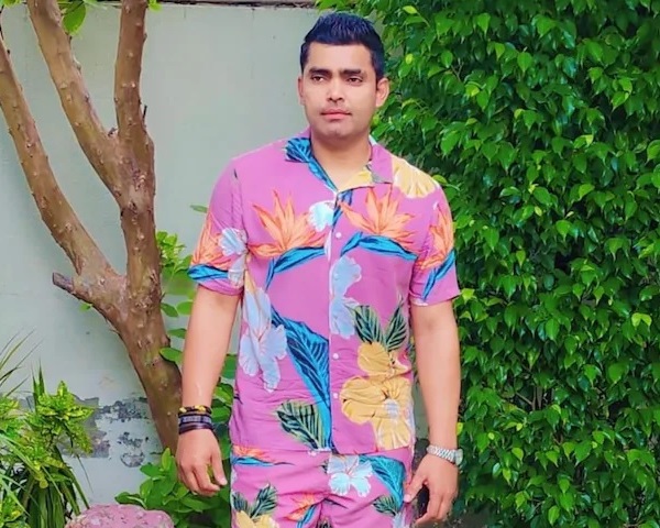 Umar Akmal Trolled For Posing In A Pink Floral Printed Shirt, Netizens Call Him ‘Barbie’ - RVCJ Media